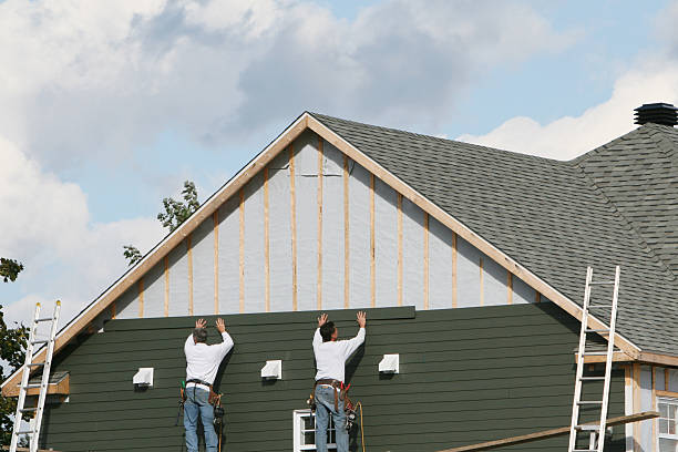 Professional Siding Replacement technician working in Ellenwood, GA